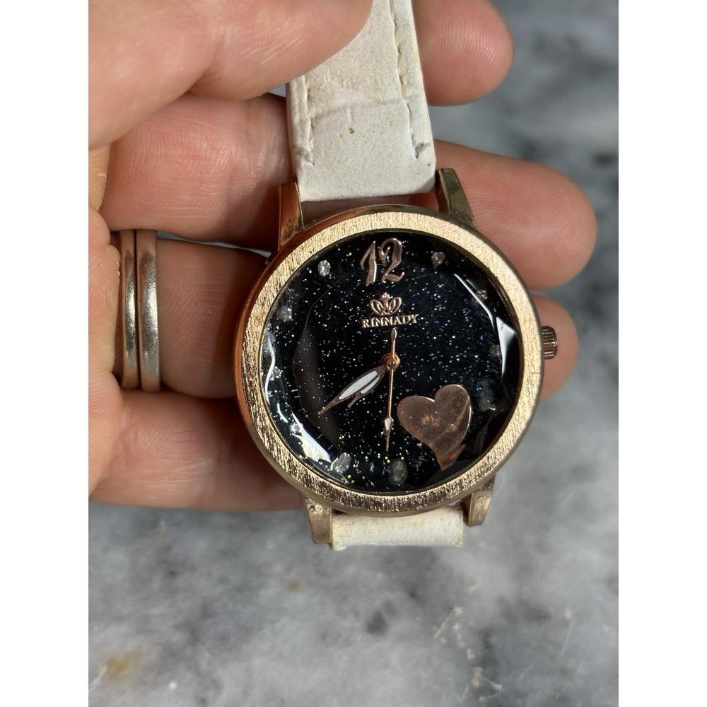 RINNADY Women's Analog Wristwatch Gold Case White Leather Strap Black Heart Dial